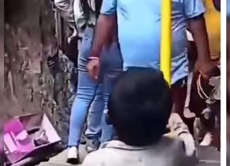 वायरल वीडियो में एक छोटा लड़का लोगों को मास्क पहनने की हिदायत दे रहा है